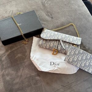 Cute designer inspired wallet on a chain.